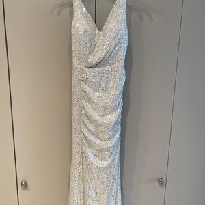Silver sequins gown with split